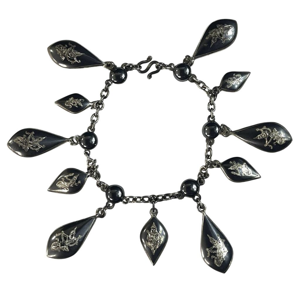 Antique Siam Sterling Silver Niello Bracelet 7” - 11 Puffy Double Sided Charms.